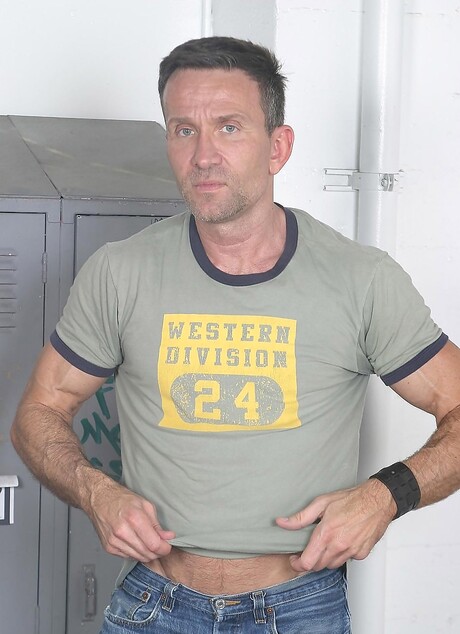 Muscle hunks in a locker room