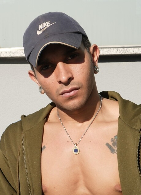 Tattooed tough guy shows his hung body and sexy ass